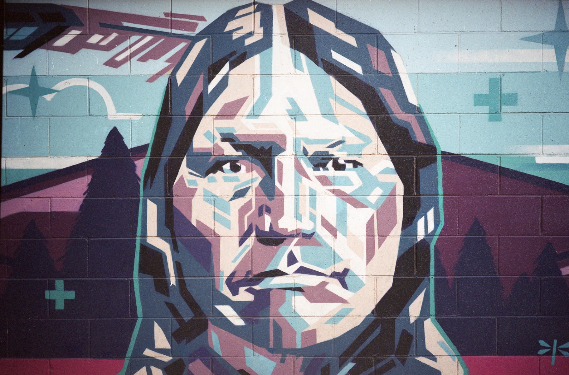 Cottonwood Square public mural honoring Chief Nowoo3 and regional Arapaho and Cheyenne historical legacy.
