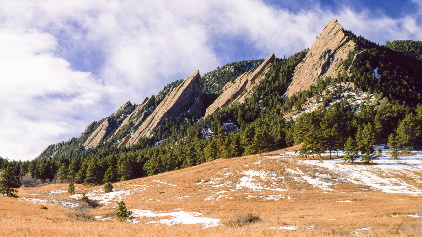 Boulder Flatirons, Arapaho and Cheyenne Tribal Consultation Landscape Boulder Flatirons on a spring day with snow, photographed for use in City of Boulder Tribal consultation-related work.